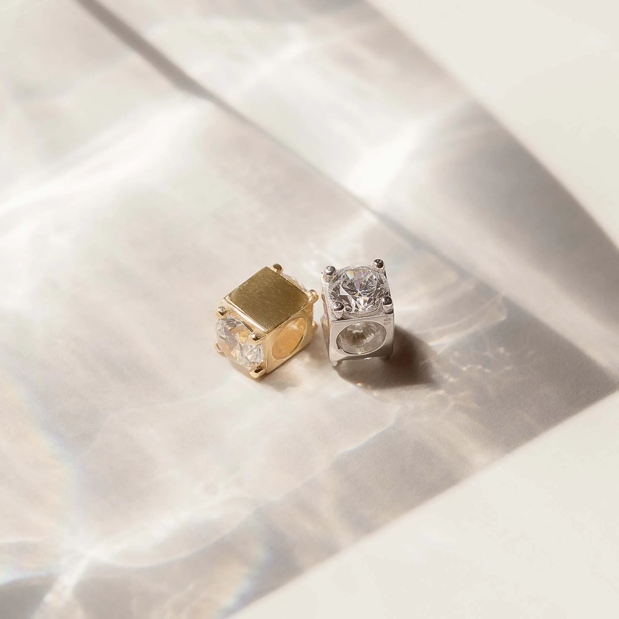Le Marais Felie 14 karat gold cube charm with zirconia stone