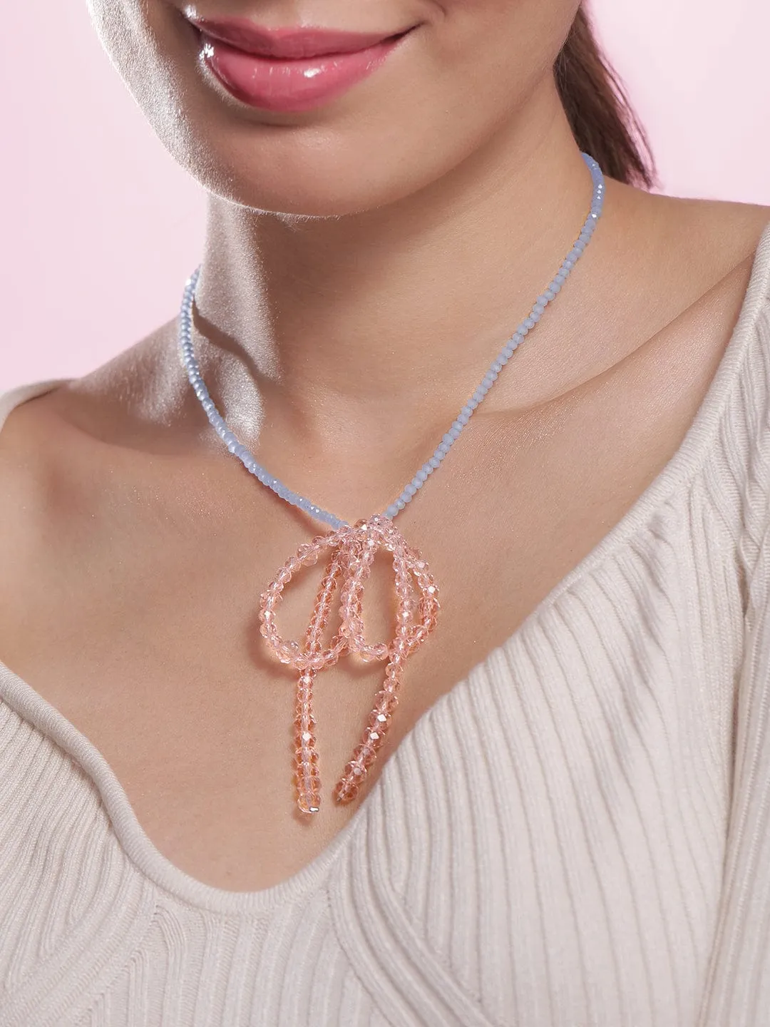Rubans hodium Plated Blue Beaded Necklace with Pink Crystal Bow Pendant