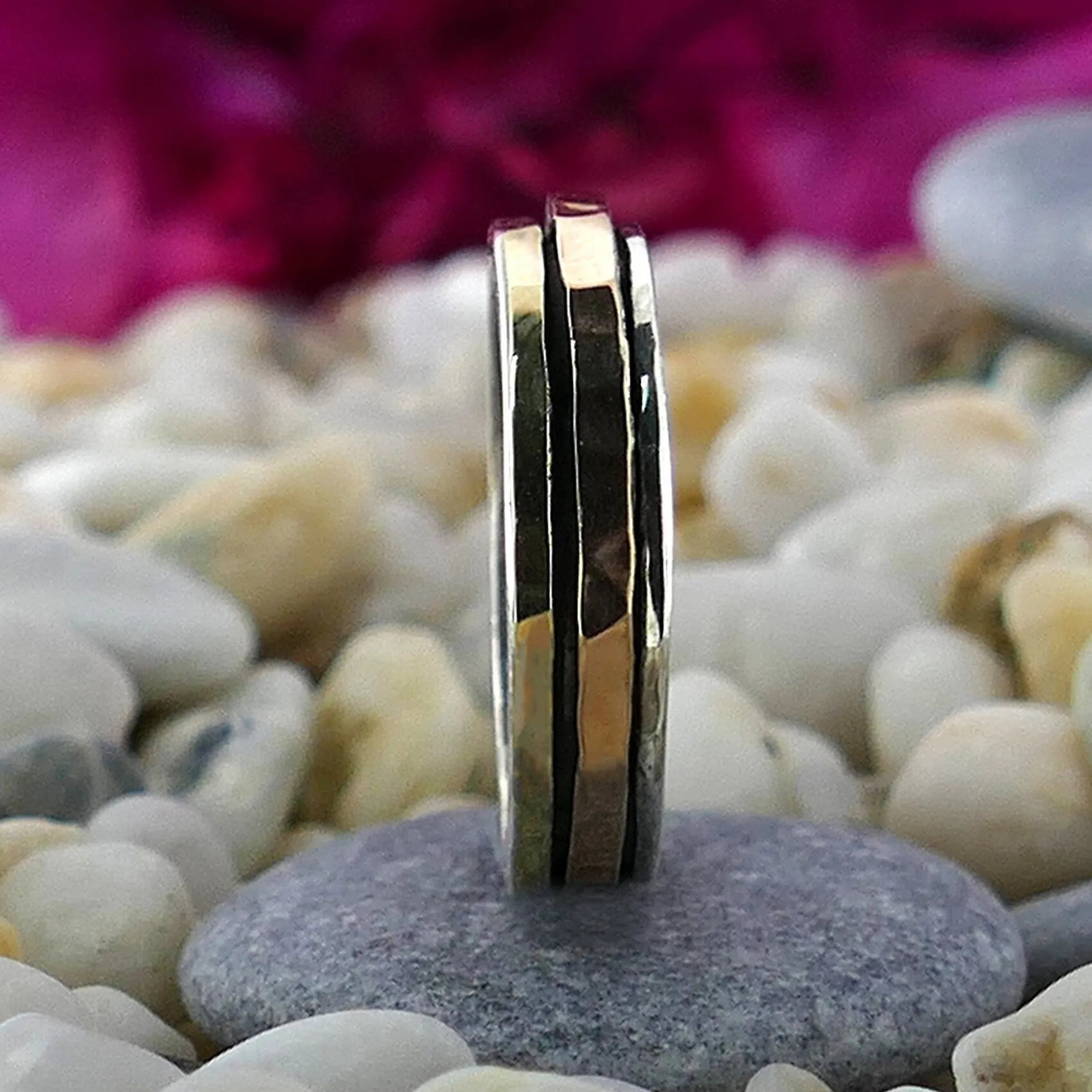 Timeless Whirlwind: Mixed Metal Silver and Gold Spinner Band